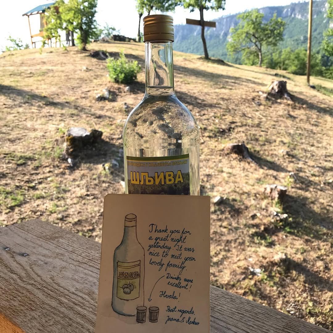 Homemade plum brandy and a guest thank-you note